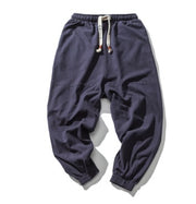 navy Men’s hip hop jogger pants with elastic pockets, tapered style, urban streetwear.