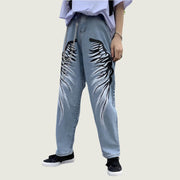 Men’s graphic printed wide-leg jeans in blue, bold streetwear style