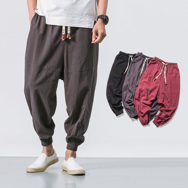 gray Men’s hip hop jogger pants with elastic pockets, tapered style, urban streetwear.