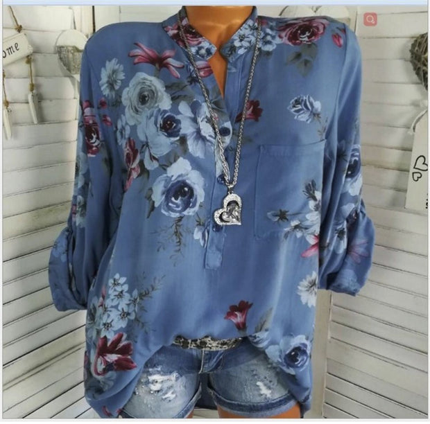 Women’s floral print stand collar blouse in blue, loose fit, plus size.