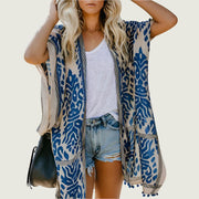 Bali beach resort kimono cardigan in blue with boho print and pom-pom detailing