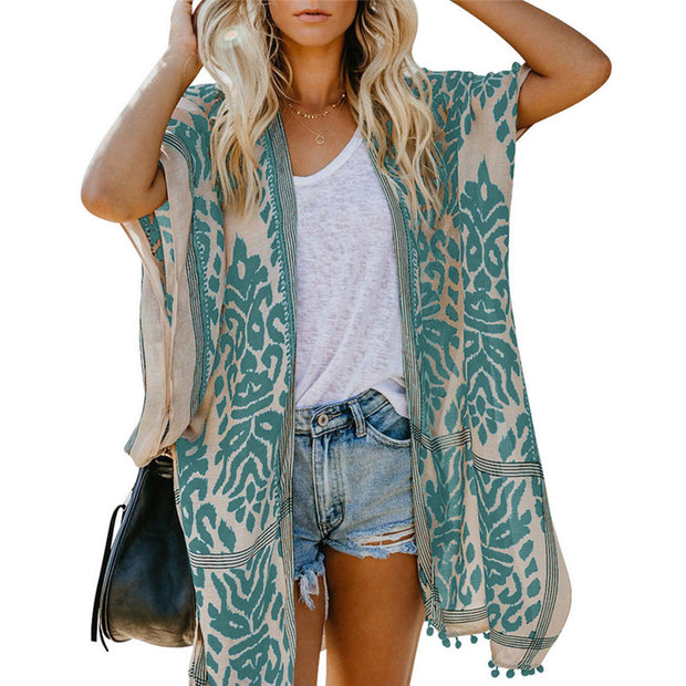 Bali beach resort kimono cardigan in Green with boho print and pom-pom detailing