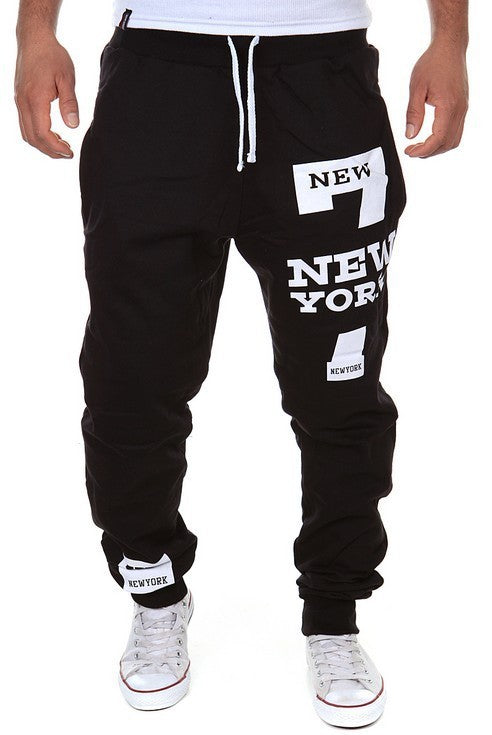 Men’s graphic print jogger pants, black with New York-inspired design