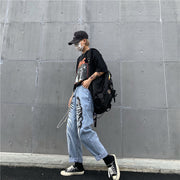 Men’s graphic printed wide-leg jeans in blue, bold streetwear style