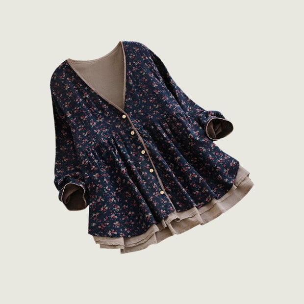 Women’s floral V-neck long-sleeve blouse in navy, elegant and loose fit.