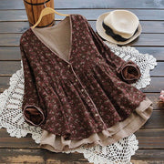 Women’s floral V-neck long-sleeve blouse in brown, elegant and loose fit.