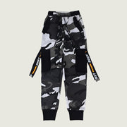 Men’s camo jogger pants with strap details, gray urban streetwear.