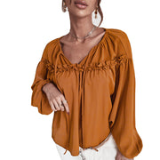 Women’s ruffled V-neck blouse in caramel with boho chic style.