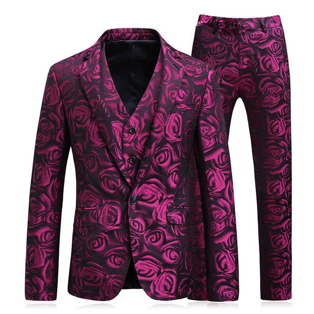 Men's floral print suit in rose red, bold formal attire for special occasions.