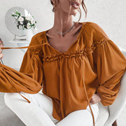 Women’s ruffled V-neck blouse in caramel with boho chic style.