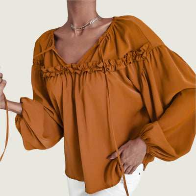 Women’s ruffled V-neck blouse in caramel with boho chic style.