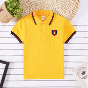 Boys’ polo t-shirt in yellow with embroidered patch, classic casual style