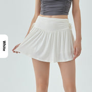 Women’s athletic yoga skirt with adjustable drawstrings in white, lightweight and sporty