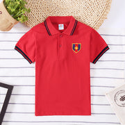 Boys’ polo t-shirt in red with embroidered patch, classic casual style